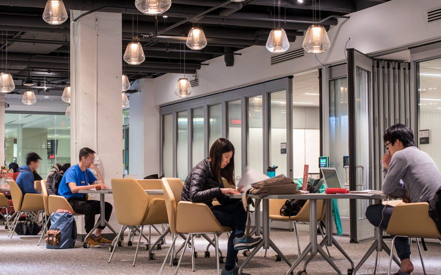 students sitting in the Learning Commons studying