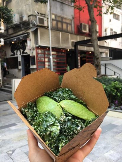 Food container with green vegetables