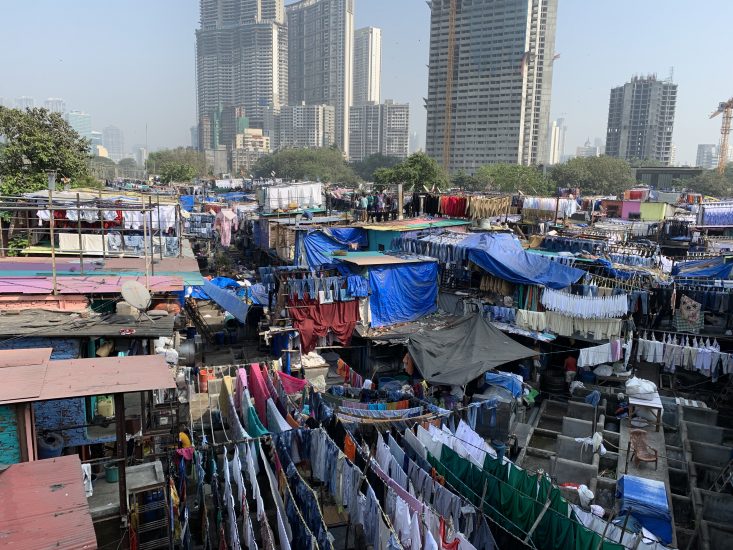 open-air laundry system at Dhobi Ghat with laundry on clothes lines