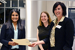 Suzanne and Amanda Samuel Dove present Best Reflection award to student